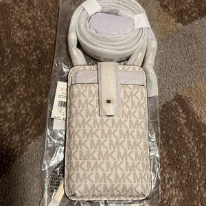 Brand new Michael kors cross body phone and credit card wallet
